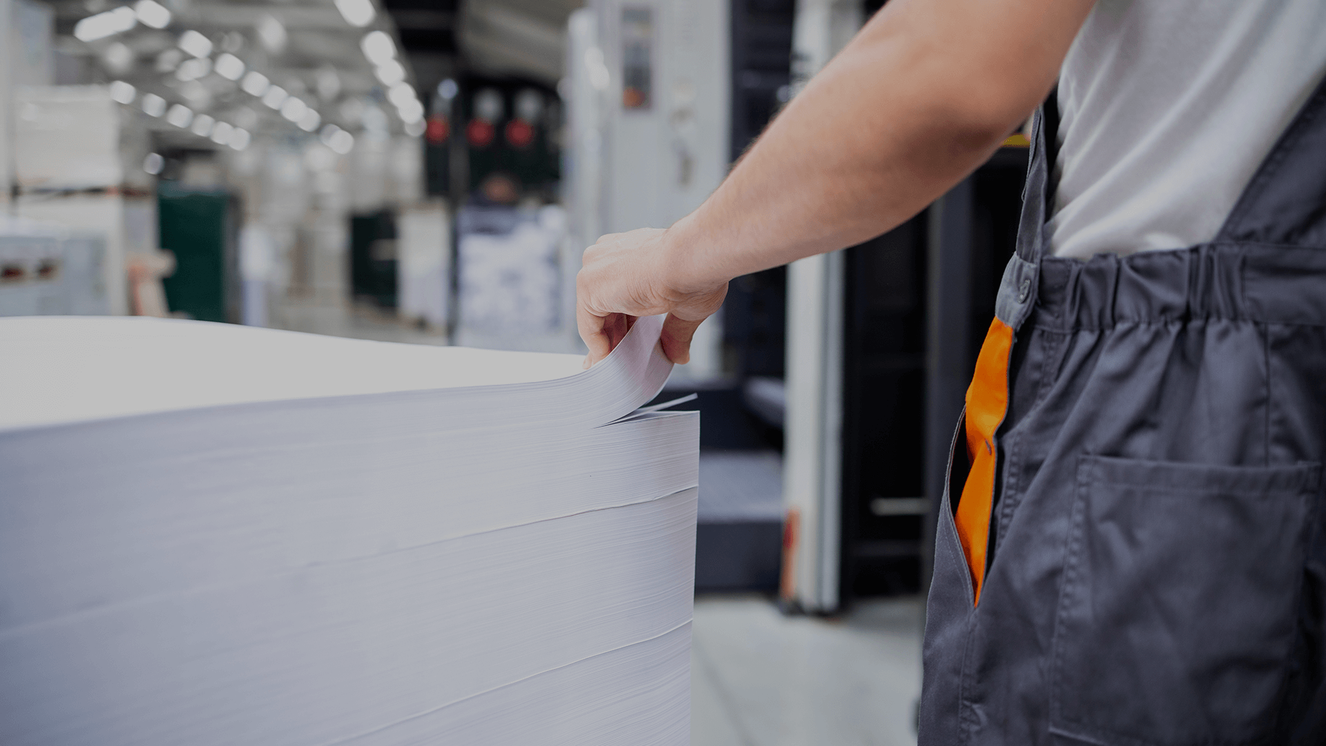 Person touching stack of papers